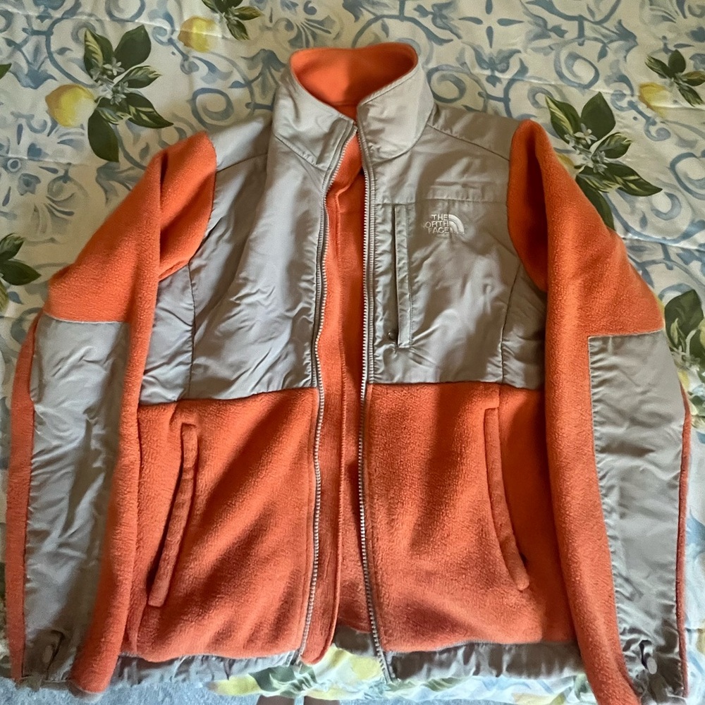 The North Face Orange zip up jacket